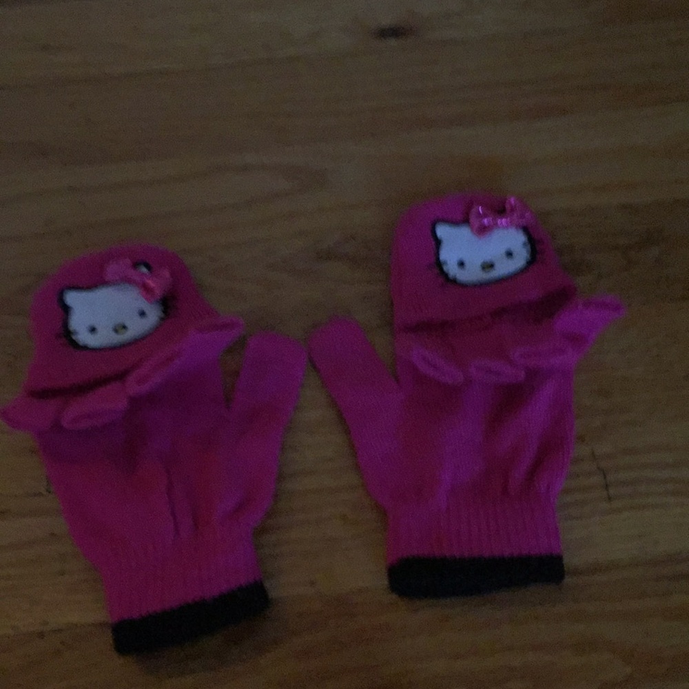 Hot pink, hello kitty, half mitten & half gloves.